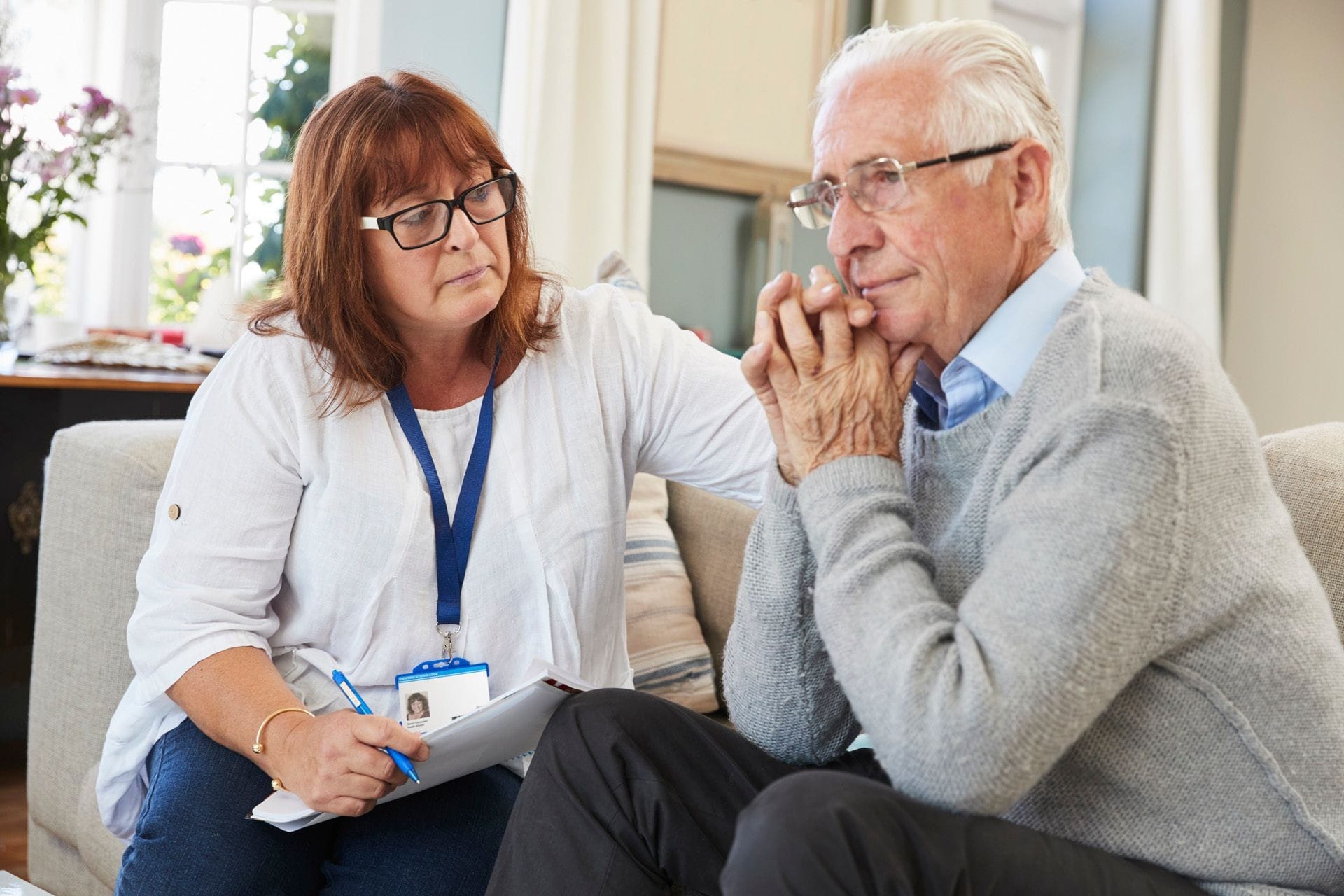 Speech/Language therapist with an elderly male patient